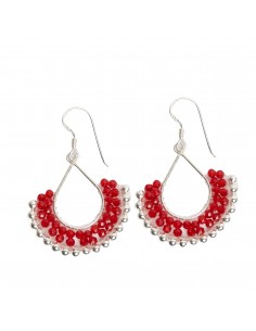 Pendiente de plata y shakira.