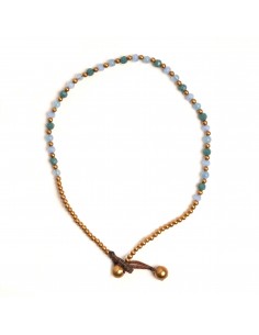 Tobillera de bronce combinada con piedras .