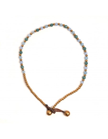 Tobillera de bronce combinada con piedras .