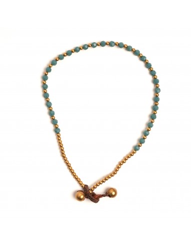Tobillera de bronce combinada con pierdras.