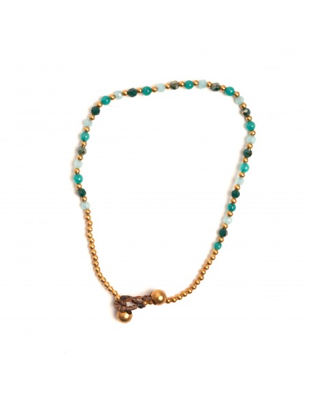 Tobillera de bronce combinada con piedra.