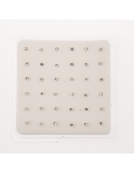 Pendiente nariz de plata con Zirconita engastada por 4 garras.Diámetros surtidos . 36 un.