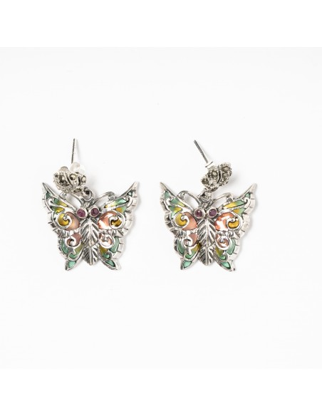 Pendientes mariposa de plata combinados con vidriera.