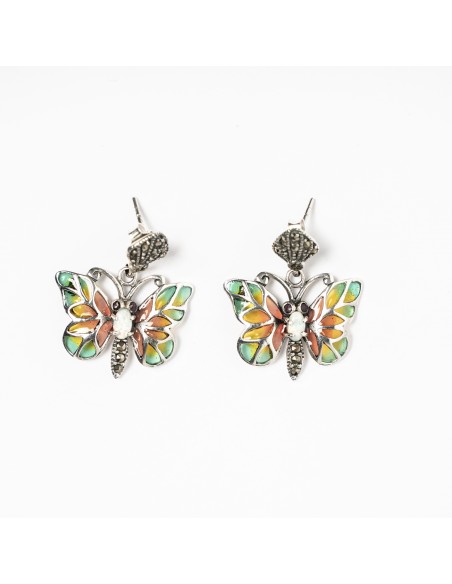 Pendientes mariposa de plata combinados con vidriera.