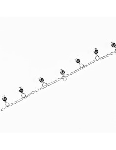 Tobillera de Plata con bolitas colgando.