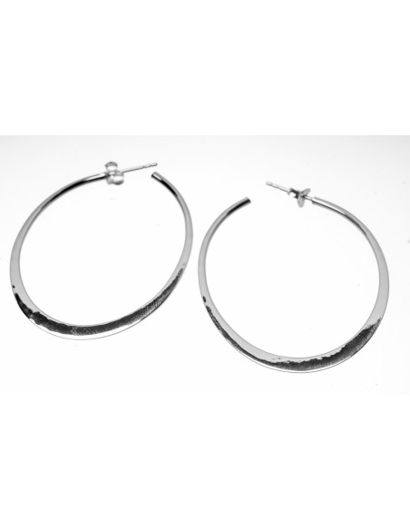 Aros de plata lisa en ligera disminución . Variedad de diámetros.