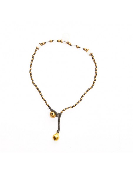 Tobilleras de bronce y piedras .